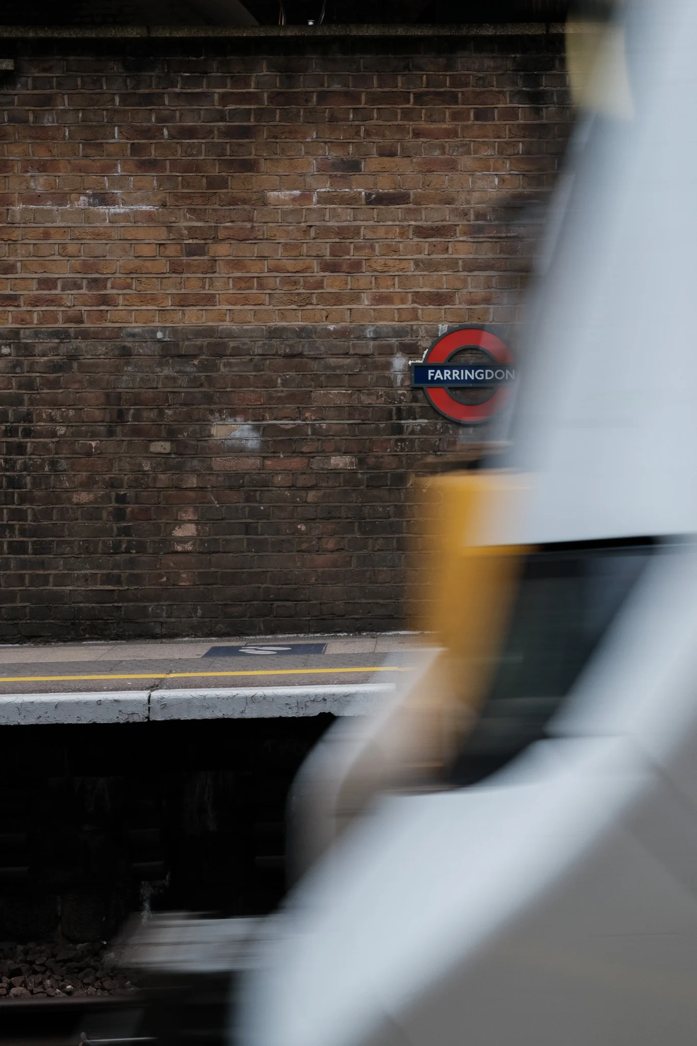 Farringdon Station with Blurry Passing Train