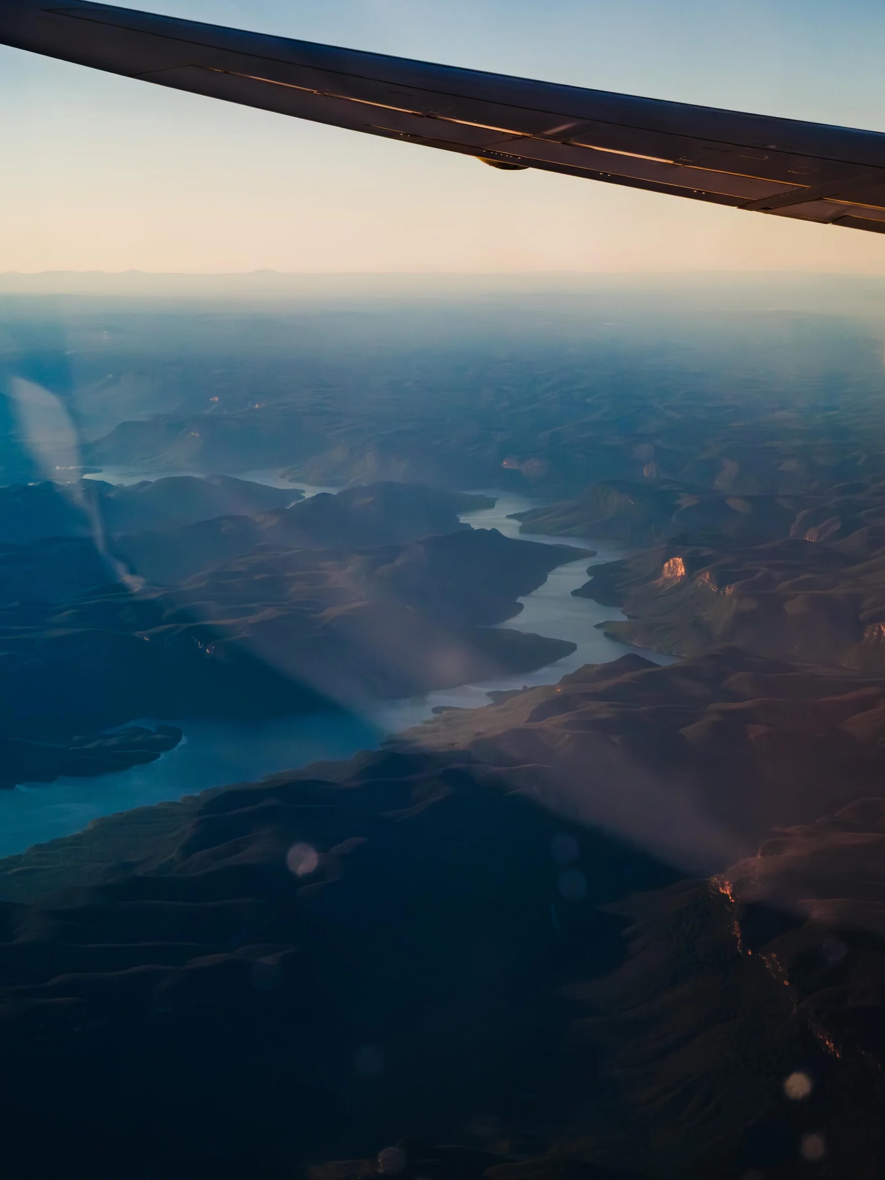 Golden Hour Over Mountainous River