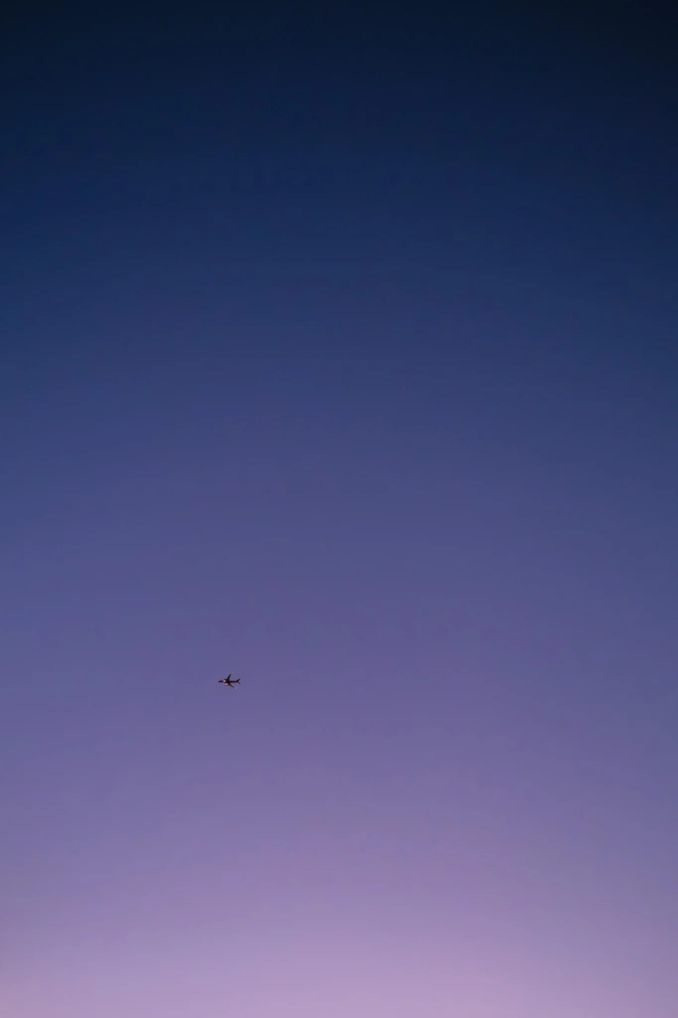 Airplane in Twilight Sky