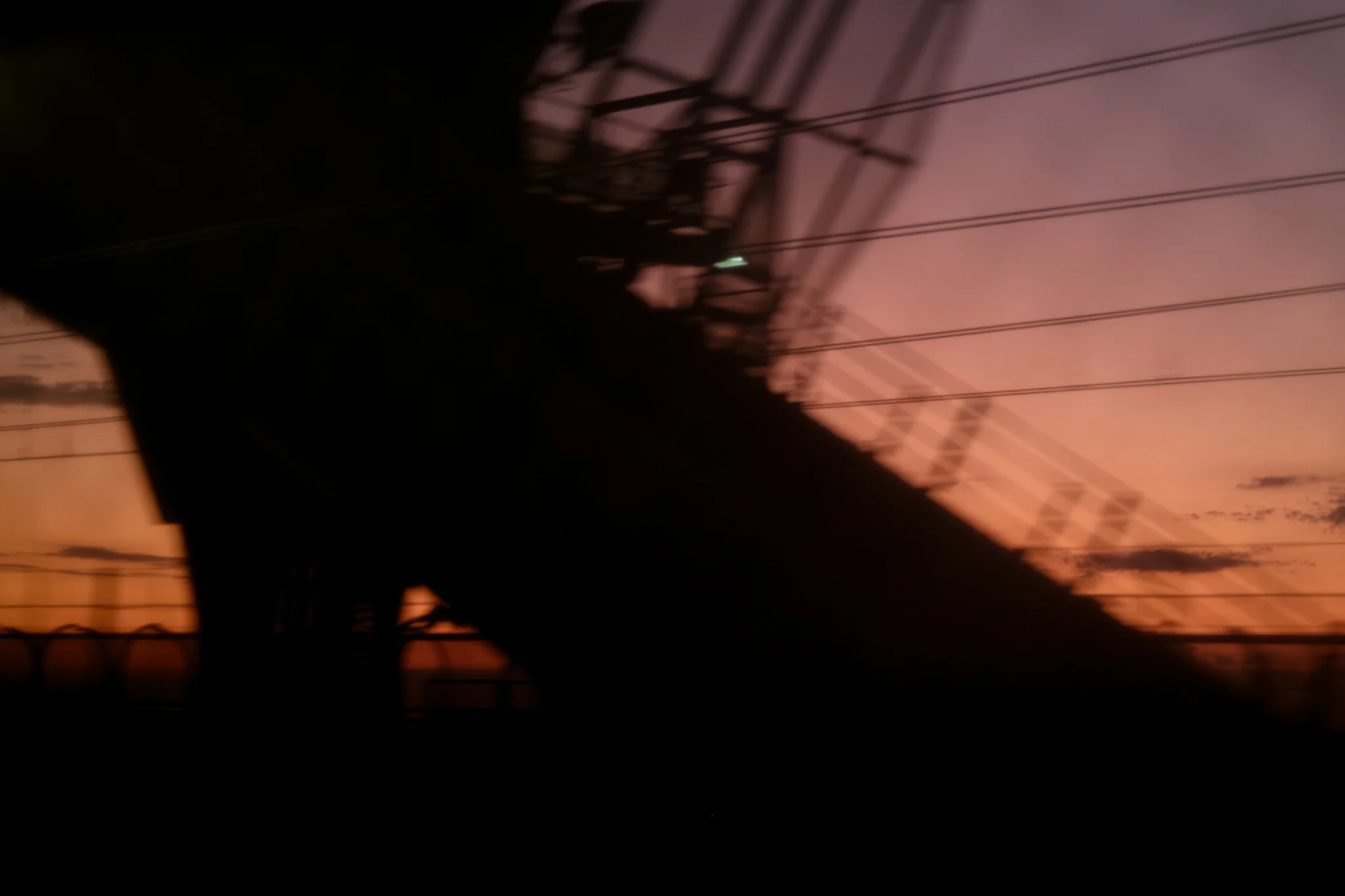 Blurred Bridge at Sunset
