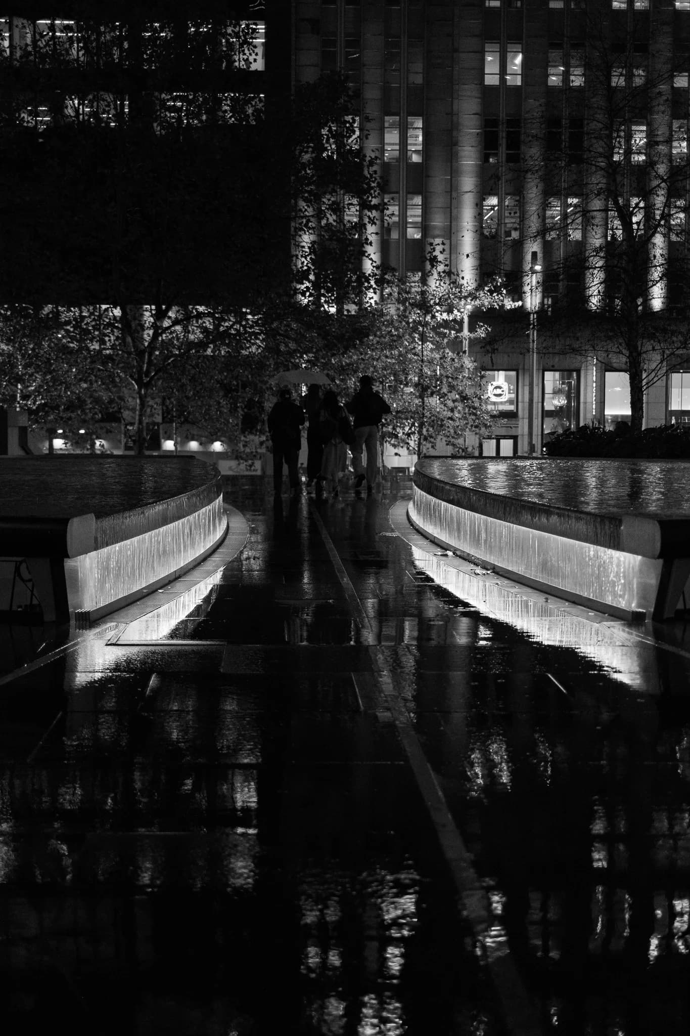 Night Walk by Illuminated Fountains