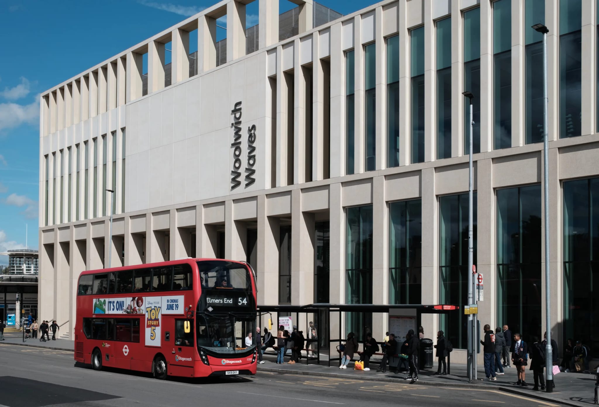 Woolwich Waves Building and Red Bus