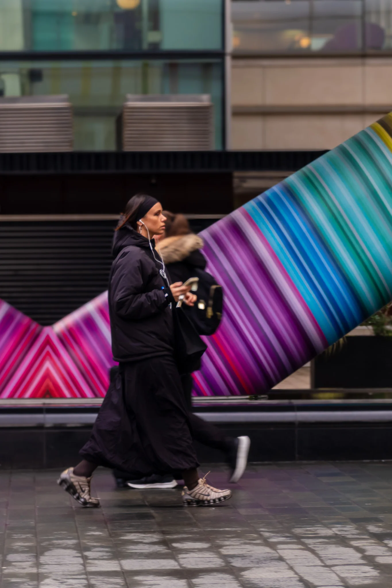 Woman Passing Colorful Art