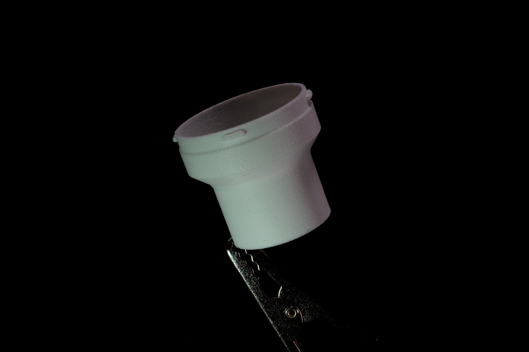 The adapter from above, showing both connection diameters