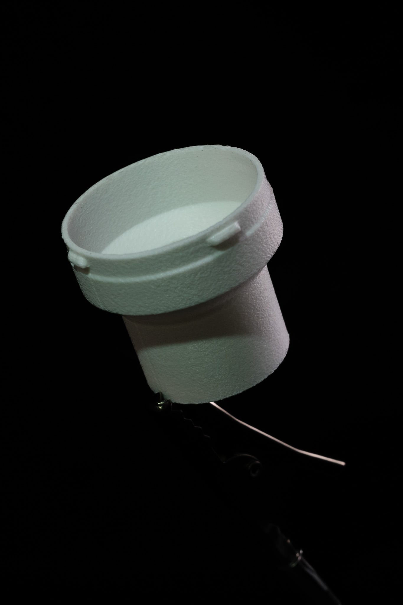 The hose-side opening, sized to accept a standard 22mm CPAP connector