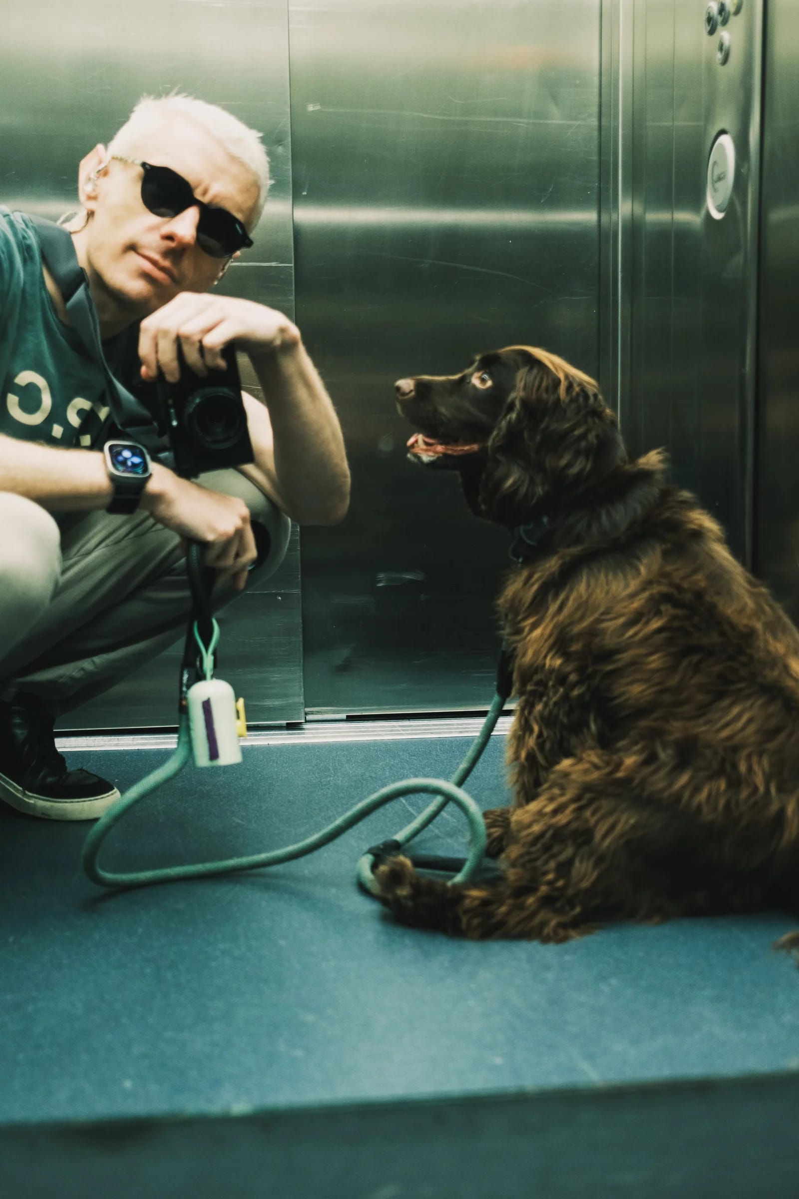 Photographer and Dog Elevator Portrait