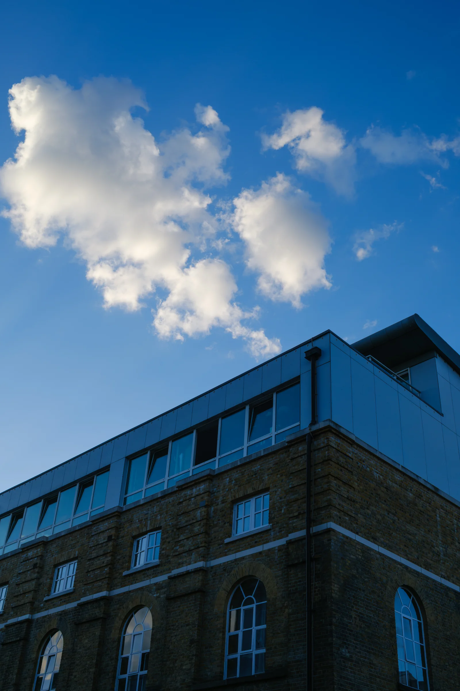Urban architecture under a cloudy sky
