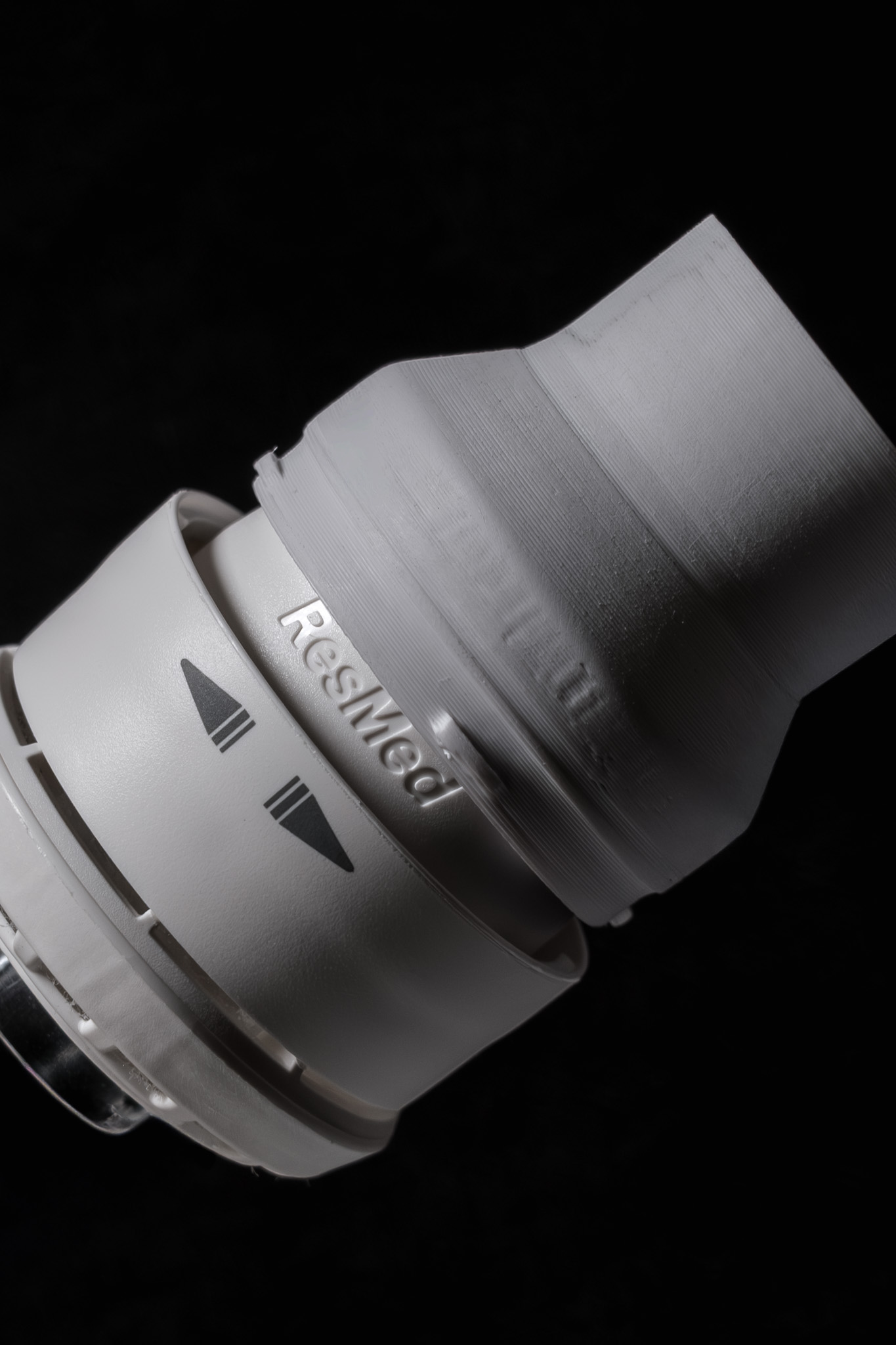 Close-up of the finished adapter showing print quality and fit with the ResMed HumidX component